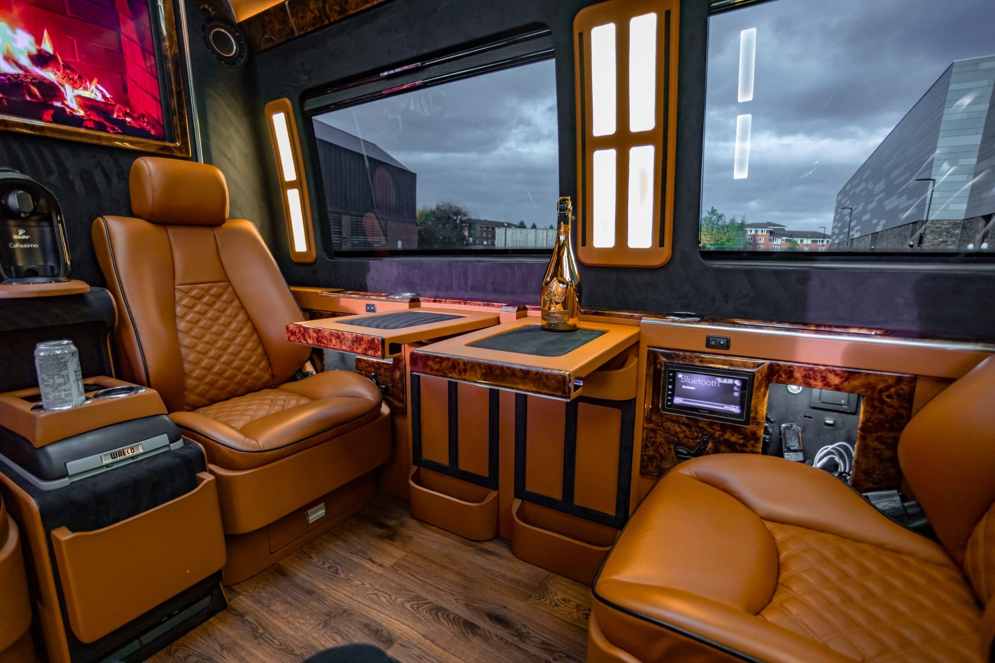 Luxurious cognac leather interior with burl wood trim